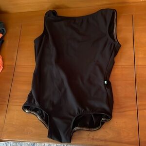 Lucky Leo Women’s black leotard. Excellent condition. SIZE L